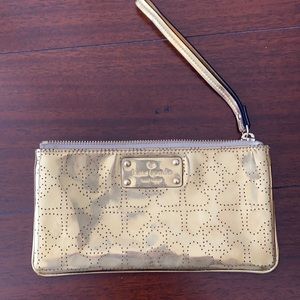 Kate Spade gold large wristlet hearts